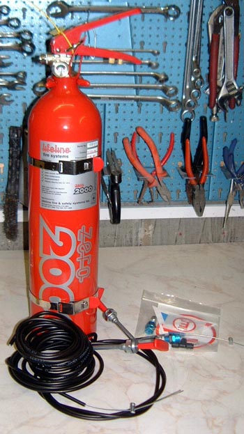 Plumbed in fire extinguisher
