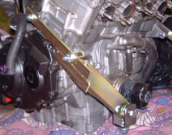 Front engine mount attached to engine