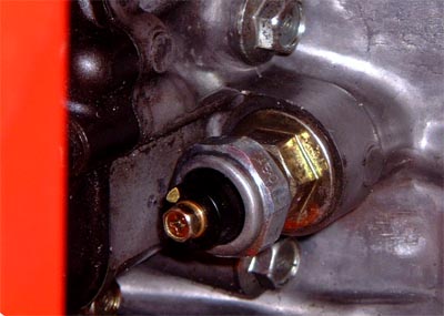 Oil pressure switch on the front of the engine