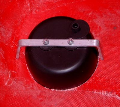 Strap holding rear light in