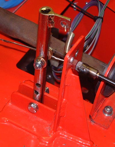 Repositioned cable attachment on throttle pedal