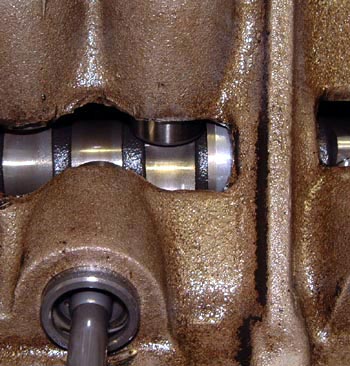 Dislodged camshaft bearing